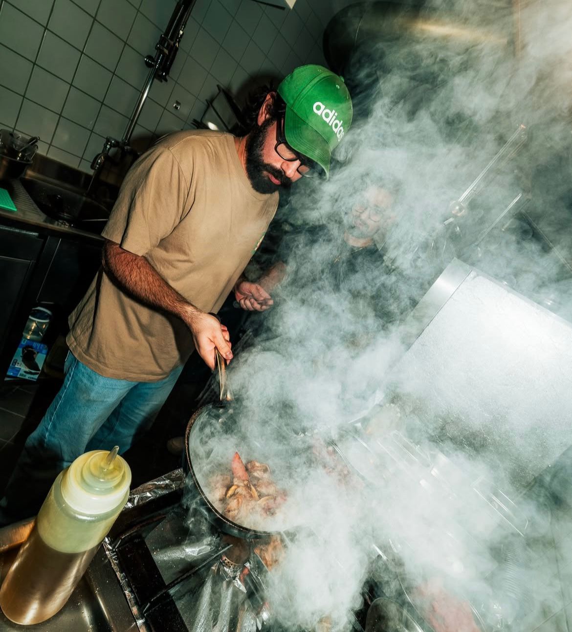 Carlos cooking in the kitchen
