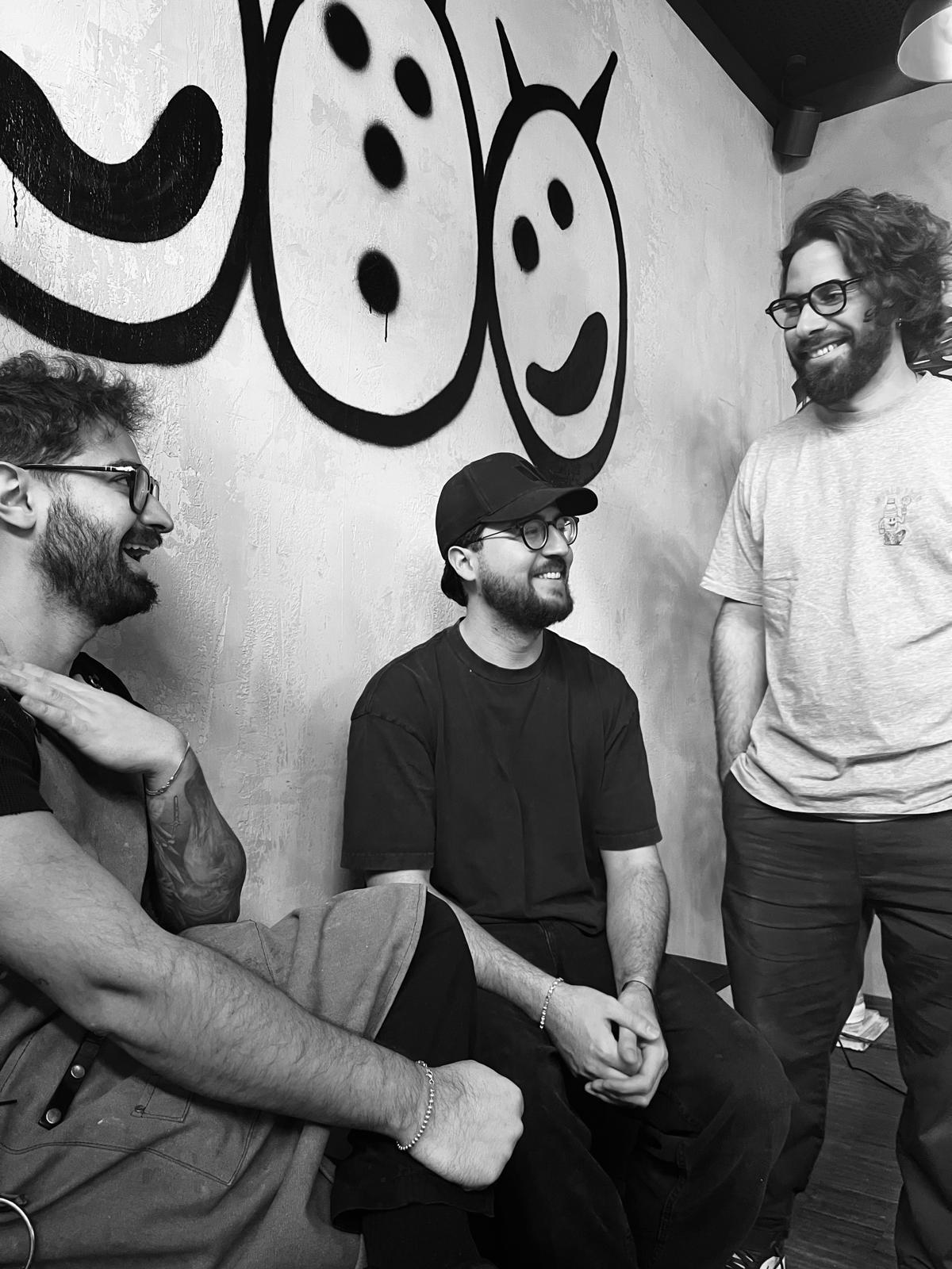 Carlos, Jesus and Charles together in the restaurant